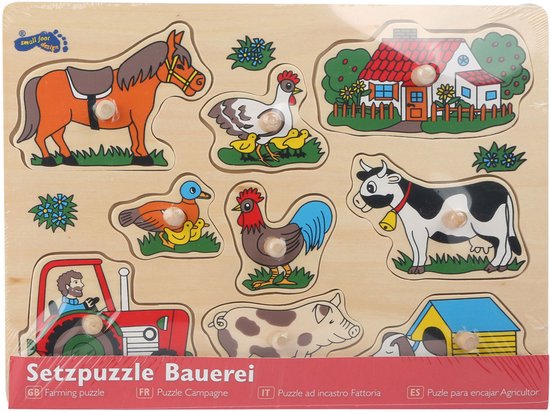 Houten inlegpuzzel Boerderij. Bevat tractor, paard, kip, eend, haan, koe, varken, hond en huis. 'Setzpuzzle Bauerie' is onderaan zichtbaar.