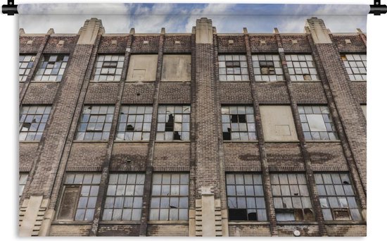 Wandkleed Verlaten gebouwen - Verlaten gebouw met ingeslagen ramen Wandkleed katoen 150x100 cm - Wandtapijt met foto