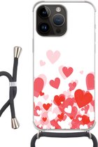 Geschikt voorApple Iphone 14 Pro - Crossbody Case - Een illustratie van een regen van hartjes - Siliconen - Crossbody - Backcover met Koord - Telefoonhoesje met koord - Hoesje met touw