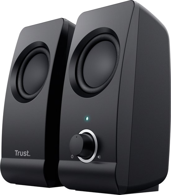 Twee zwarte Trust speakers met ronde speakers en een volumeknop op de rechter speaker.
