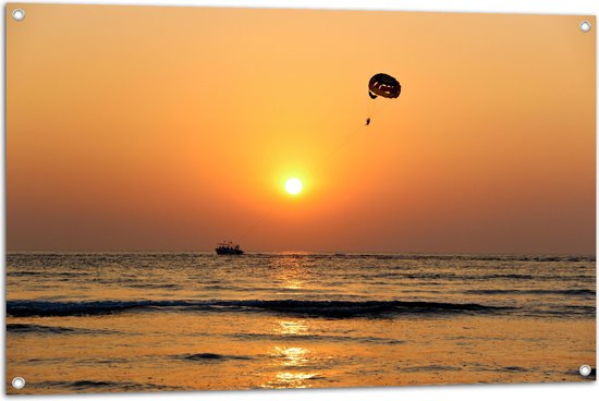 WallClassics - Poster de jardin - Parachute ascensionnel au coucher du soleil sur la mer - 105 x 70 cm Photo sur poster de jardin (décoration murale pour l'extérieur et l'intérieur)