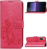 Voor Sony Xperia 10 II vierbladige gesp reliëf gesp mobiele telefoon bescherming lederen tas met lanyard & kaartsleuf & portemonnee & beugel functie (magenta)