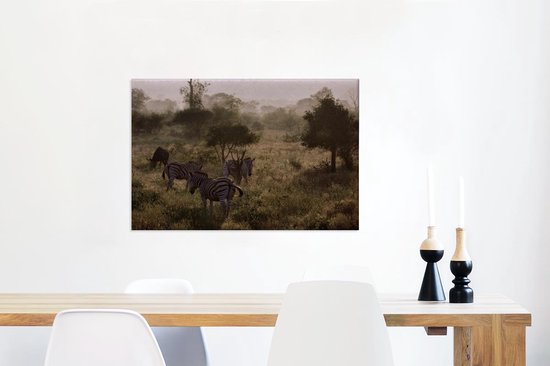 Canvas Schilderij Mistige ochtend in het Krugerpark in Zuid-Afrika - 90x60 cm - Wanddecoratie
