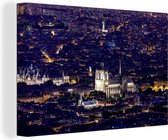 Canvas schilderij 140x90 cm - Wanddecoratie Panorama van Parijs en de Notre Dame - Muurdecoratie woonkamer - Slaapkamer decoratie - Kamer accessoires - Schilderijen