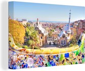 Canvas Schilderij Het Park Guell met de beroemde architecturale keramische kunst - 180x120 cm - Wanddecoratie XXL