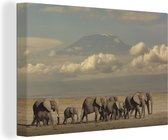 Canvas schilderij 150x100 cm - Wanddecoratie Afrikaanse olifanten op de savanne - Muurdecoratie woonkamer - Slaapkamer decoratie - Kamer accessoires - Schilderijen