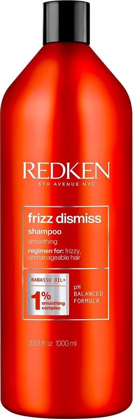Grote fles Redken Frizz Dismiss shampoo in glanzend oranje, 1000 ml.