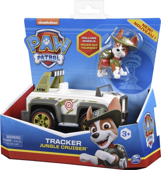 Speelgoed in verpakking: witte terreinwagen met camouflageprint, hond in safari-outfit en Paw Patrol logo.