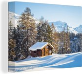 Canvas Schilderij Hut in de bergen van Zwitserland tijdens de winter - 40x30 cm - Wanddecoratie