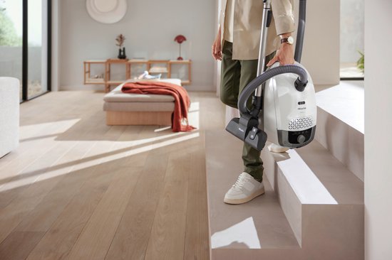 Miele Guard S1 stofzuiger met zak 890W Sunsetgeel Compact model met ComfortFit filtersysteem en Dynamic Drive