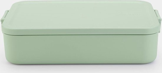 Boîte à pain Brabantia vert jade avec couvercle et fermoirs sur les côtés.