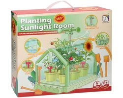 Plantenkas speelgoed kas met lichtinval en irrigatiesysteem.