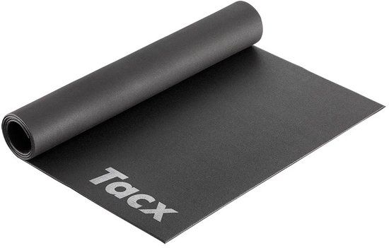 Zwarte Tacx fietstrainer mat, deels opgerold.