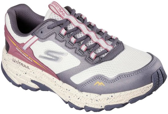 Witte, roze en grijze wandelschoen met een lichtbruine gespikkelde zool en roze veters.