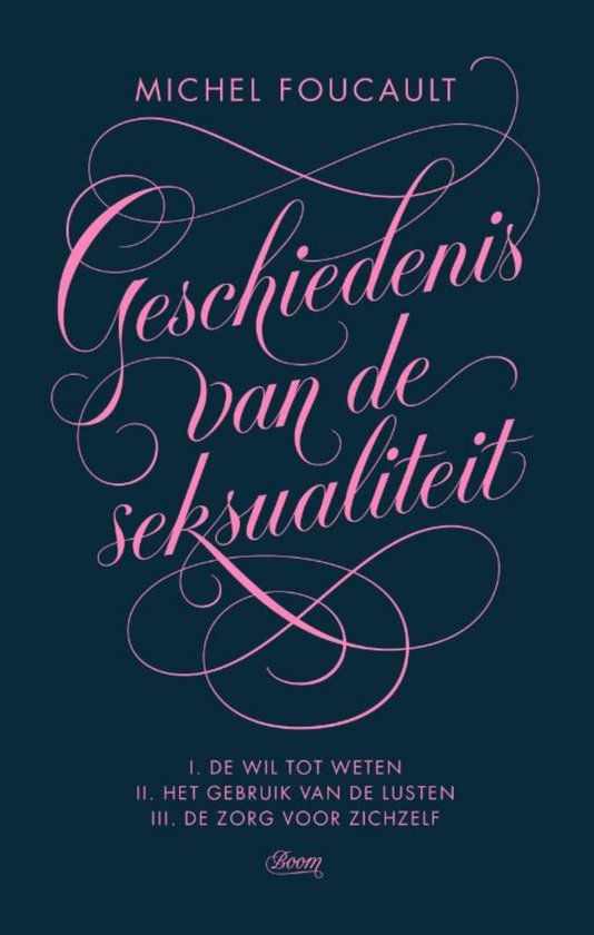 Boek kaft met de titel 'Geschiedenis van de seksualiteit' in sierlijke roze letters op een donkerblauwe achtergrond.