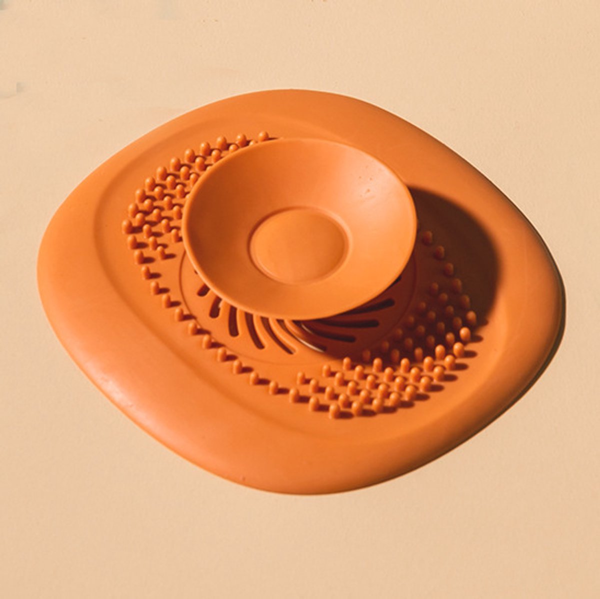 Siliconen afvoerbeschermer en haarvanger – Opvouwbare afdekking voor douche en bad – Afvoerstop voor badkamer, keuken en wasruimte – Oranje