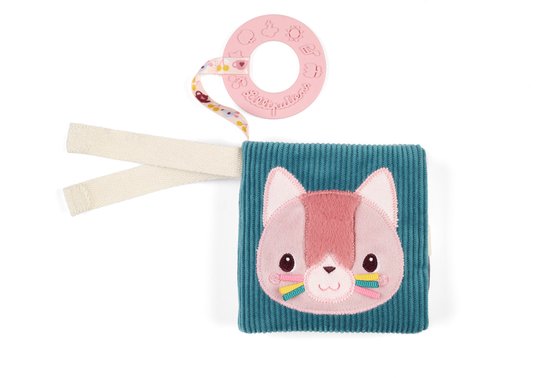 Zacht, petrolkleurig stoffen boekje met geborduurde roze kattenkop, speelring en lus.