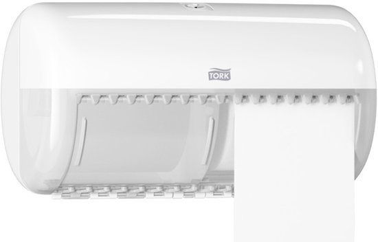 Witte Tork toiletpapierdispenser met een rol papier die naar buiten hangt.