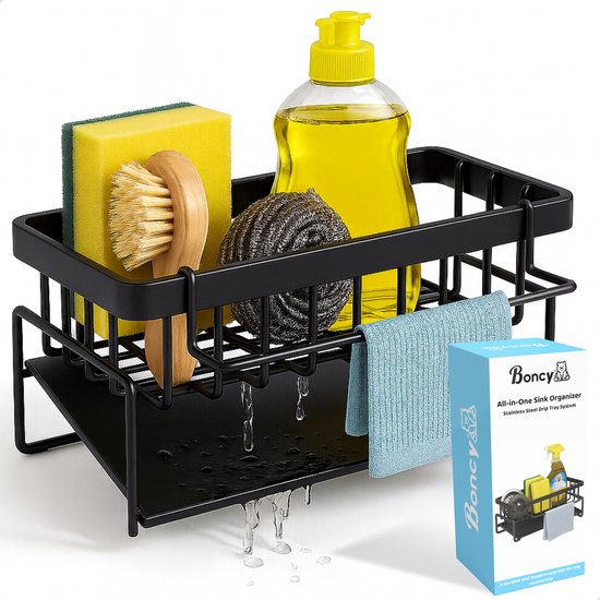 Organisateur d'évier noir avec savon, éponge, brosse, boule à récurer et serviette, l'eau s'égoutte du bac.