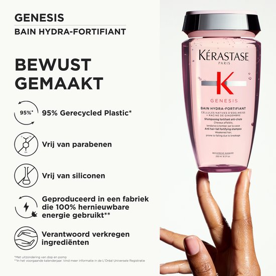 Main tenant une bouteille Kérastase Genesis Bain Hydra-Fortifiant, avec des informations sur 95% de plastique recyclé, sans parabène et sans silicone.