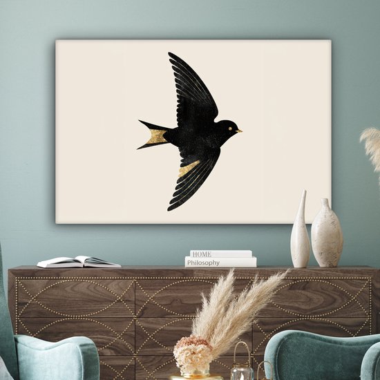 Canvas schilderij 120x80 cm - Wanddecoratie Zwarte zwaluw - Gouden accenten - Lichte achtergrond - Muurdecoratie woonkamer - Slaapkamer decoratie - Kamer accessoires - Schilderijen op canvas