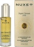 Nuxe Super Serum [10] anti-age serum en bijpassende gouden verpakking met gedetailleerd cirkelpatroon.
