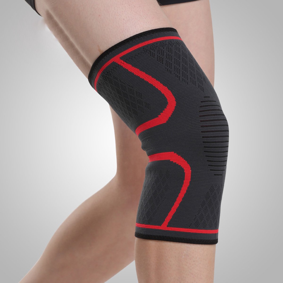 Jonyx - Kniebrace - Knieband - Compressie - Bandage - Knee sleeve - Tegen blessures - Elastisch - Grijs/rood - Maat XL