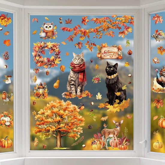Herfst raamstickers op een raam, met katten, herten, uil, kalkoen en herfstbladeren.