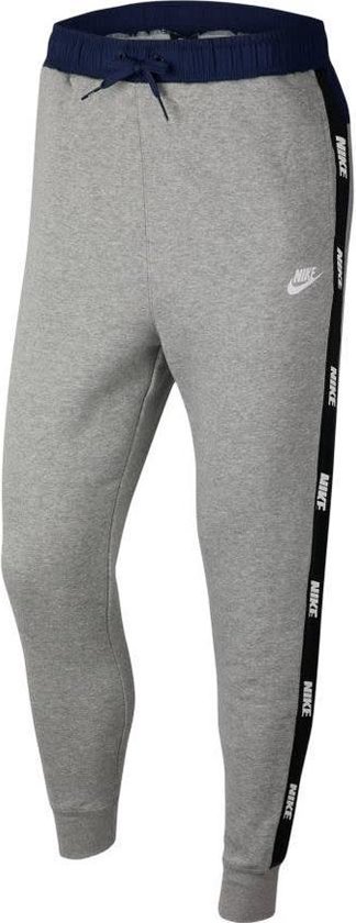 Nike Sportswear Tape trainingsbroek jongens grijs | bol.com