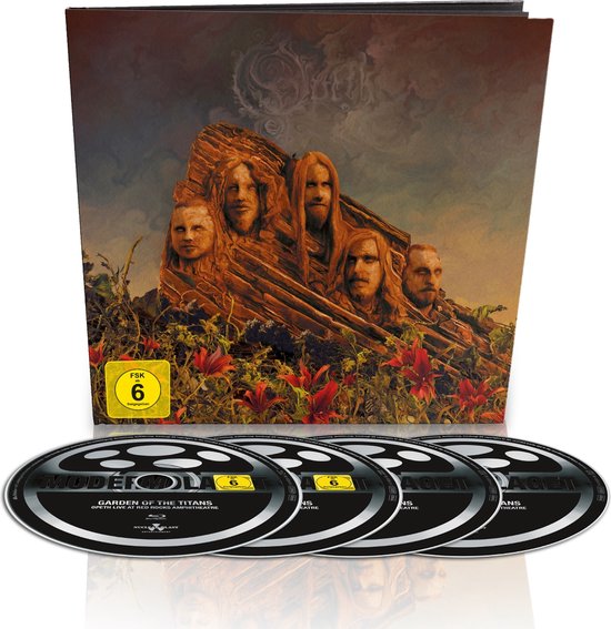 De cover van Garden of the Titans toont vijf gezichten uitgehouwen in een rots, met rode bloemen en planten op de voorgrond. Drie cd's liggen ernaast.