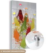MuchoWow® Glasschilderij 40x60 cm - Schilderij acrylglas - Flessen van frisdrank in ijs - Foto op glas - Schilderijen
