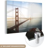 MuchoWow® Glasschilderij 180x120 cm - Schilderij acrylglas - Ochtendmist bij de Golden Gate Bridge in Californië - Foto op glas - Schilderijen