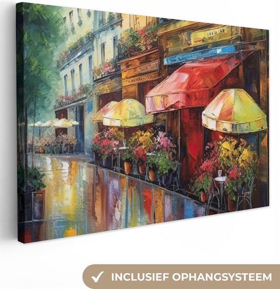 Een kleurrijk schilderij van een Parijse straat met cafés, parasols en bloemen, met ophangsysteem.