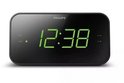 Zwarte Philips wekkerradio met grote, groene digitale cijfers.
