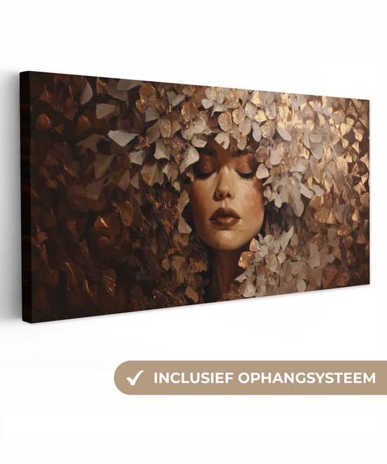 Canvas schilderij van een vrouw met gesloten ogen, hoofd omringd door gouden en witte bladeren, met "inclusief ophangsysteem".