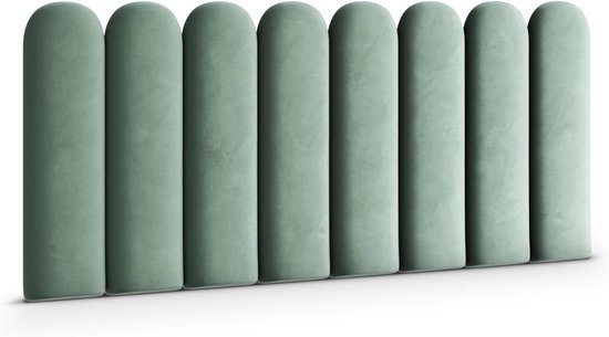 Rij van acht lichtgroene, fluwelen wandpanelen met afgeronde bovenkanten.