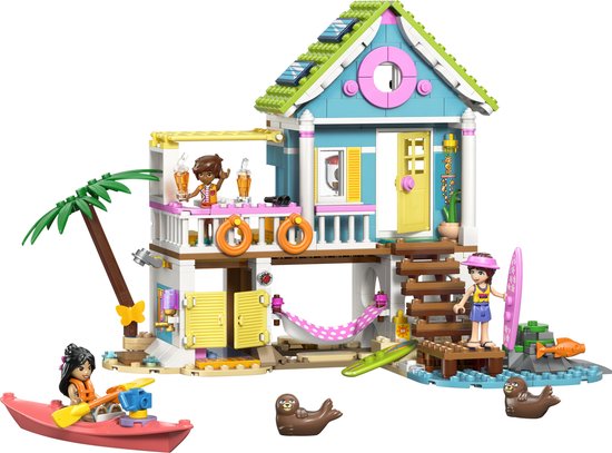 Strandhuis met zeepaardjes, kajak, en minipoppen.