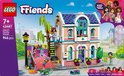 LEGO Friends Liann's Familiehuis doos met roze huis, skateboardbaan en zes poppetjes.