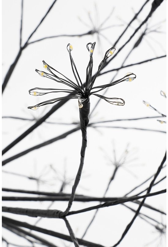 Branche métallique noire avec de petites LED blanc chaud à l'extrémité, en forme d'étoile ou de fleur.