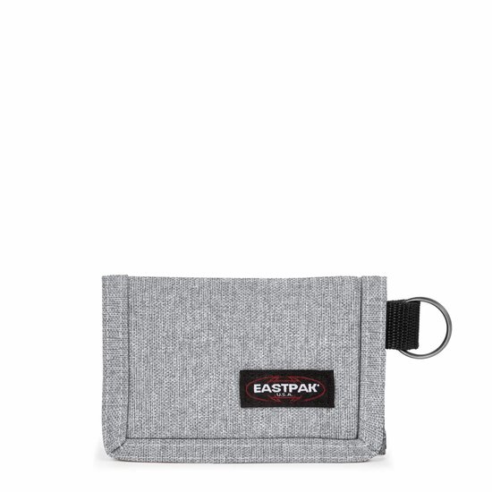 Grijs Eastpak Mini Crew portemonnee van textiel met een zwart Eastpak logo en een ring met lus.
