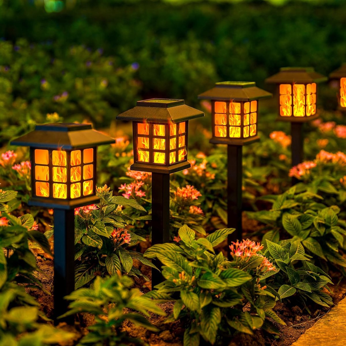 SnelShoppen - 12 Stuks Solar Buitenverlichting met Vlam Effect - Waterdichte Tuinlampen voor Tuin, Pad, Oprit, Patio - Automatische Aan/Uit Functie