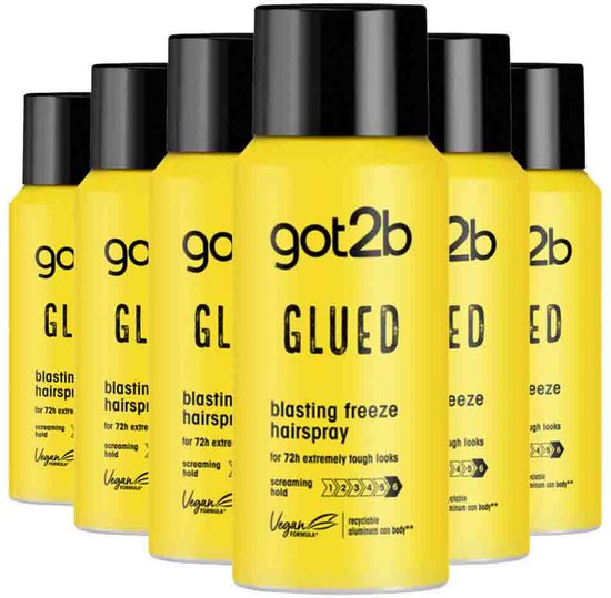Groep van zes gele spuitbussen Got2b Glued Blasting Freeze Hairspray met zwarte doppen.