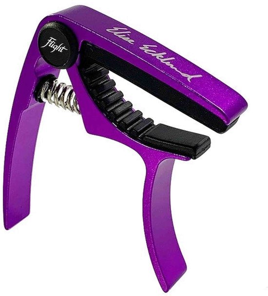 Paarse Flight ukulele capo met 'Flight' logo en 'Elise Ecklund' handtekening.