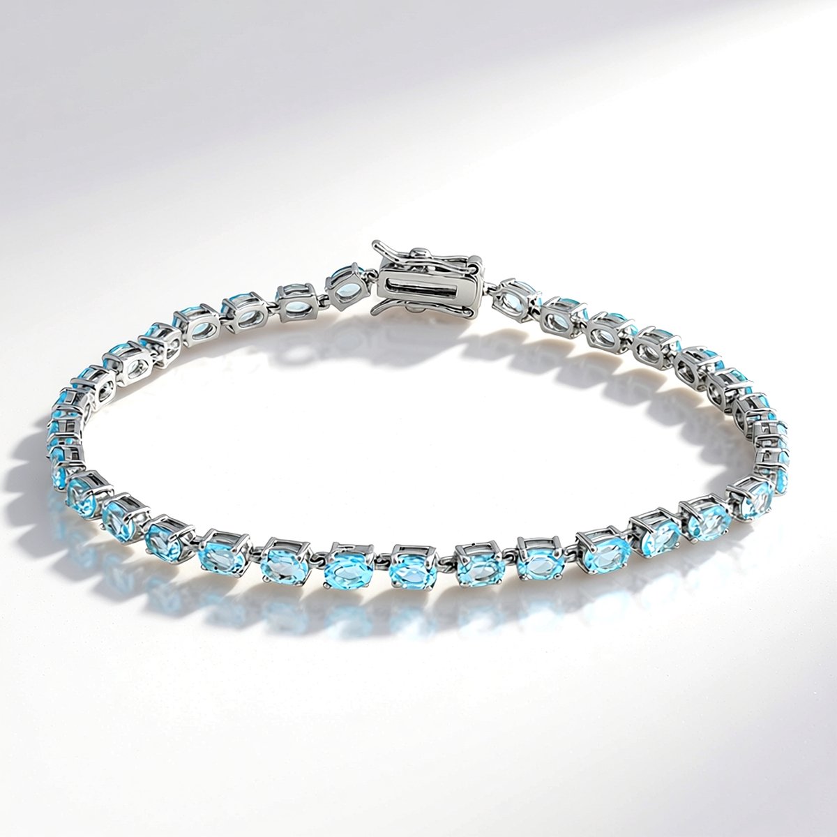 Cavill - Zilveren Armband - 925 Sterling Zilver - 32 Hemelsblauwe Ovaal Topaasstenen - 5,76 Ct - Elegante Braziliaanse Topaas Sieraden