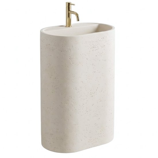 Lavabo sur pied crème texturé avec robinet doré.
