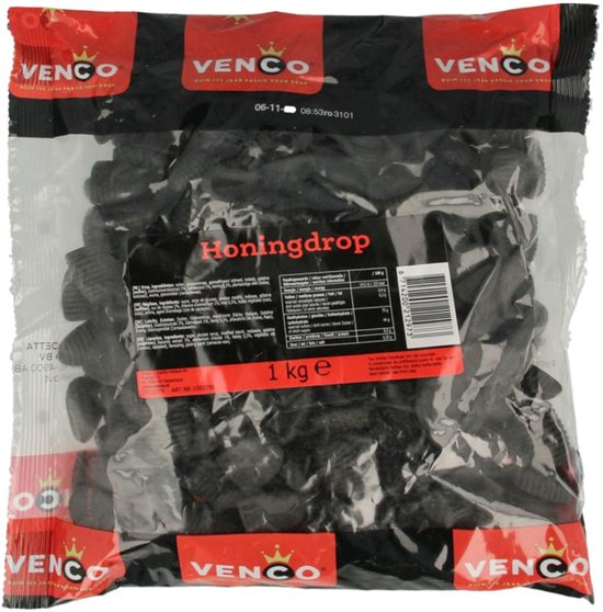 Zwarte honingdrop van Venco in een zak van 1 kg, met rode en zwarte branding en nutritionele informatie.