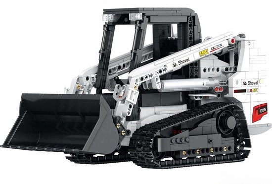 Een zwarte en witte bouwkran met rupsbanden, een grote schep en "Shovel"-opschrift.