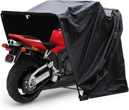 Zwarte motor tent met een rode motor erin. De voorkant staat open.