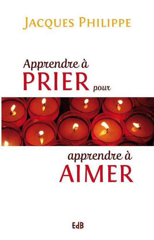 Livre 'Apprendre à prier pour apprendre à aimer' de Jacques Philippe, avec des bougies sur la couverture.