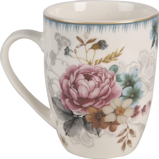 Witte mok met roze en blauwe bloemen.